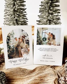 two christmas cards with the same photo and pine tree on top, sitting next to each other