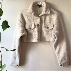 Cropped Fashion Nova Sherpa Jacket. Never Worn. Size Large Cozy White Outerwear With Buttons, Collared Beige Cropped Jacket For Winter, Beige Collared Cropped Jacket For Winter, Cozy White Button-up Outerwear, Beige Button-up Cropped Jacket For Winter, Beige Cropped Jacket With Button Closure For Winter, Cream Long Sleeve Cropped Jacket For Fall, White Cropped Jacket With Pockets For Winter, Trendy Cream Cropped Winter Jacket