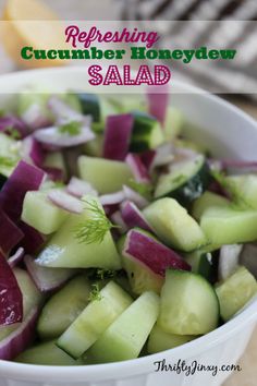 a white bowl filled with cucumber honeydew salad