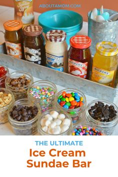 there are many different kinds of donuts on the counter top, including one with sprinkles