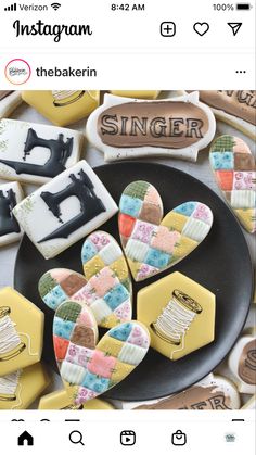 some decorated cookies are on a plate and next to sewing themed cookies that say singer