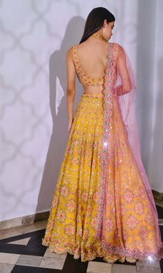 Editor's Note Featuring A Yellow Silk Organza Lehenga With Zardosi Embroidery And Touches Of Treads On Motifs. It Comes Along With Blouse And Pink Tulle Dupatta. Fabric: Silk Color: Yellow Care: Dry Clean Only About the Designer Label Aneesh Agarwaal offers regal Indian designs developed with a modern asthetic for the discerning Indian Woman. Yellow Indian Outfit, Yellow Haldi Outfit, Aneesh Agarwaal, Brown Stuff, Zardosi Embroidery, Indian Designs, Indian Outfits Lehenga, Floral Lehenga, Yellow Lehenga