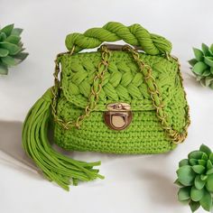 This handmade knitted green bag has a spacious interior and is a very cool piece. You can easily use this bag everywhere in your daily life.