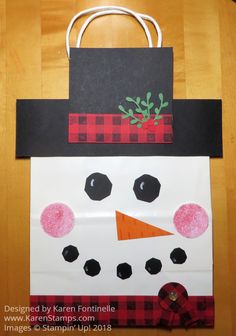 a paper bag made to look like a snowman