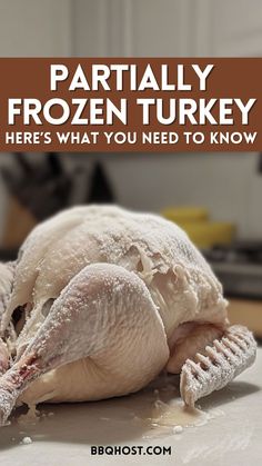 a frozen turkey sitting on top of a counter with the words partially frozen turkey here's what you need to know