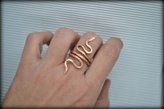 Snake Ring/gold rings/hammered ring/ancient Greece/Greek Gold Ring/Statement Ring/Spiral Ring/Greek jewelry/Wrap Ring/Wide Ring/Simple Ring/Cuff Ring/Brass Ring/Ancient Greek Ring ❤️ A unique ring inspired from Ancient Greece ★ Wire Thickness: 2mm (very sturdy and durable) ★ Available materials: - Brass - Brass, 18K Gold Plated - Copper - German Silver - Sterling Silver - Sterling Silver, 18K Gold Plated ★ Adjustable: slightly If you want to see my other rings just click the below link!! :D http Unique Handmade Snake-shaped Ring, Unique Handmade Snake Ring, Spiral Snake, Ancient Greek Ring, Snake Ring Gold, Greek Ring, Ring Wrap, Ancient Celts, Serpent Ring