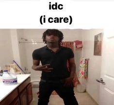 a man standing in front of a bathroom mirror with the words idc i care on it