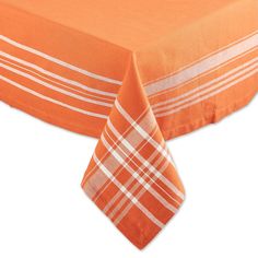 an orange tablecloth with white stripes on it and a plaid design at the bottom