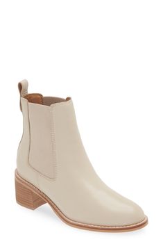 Elevate your stride with this sleek Chelsea boot detailed with stretchy herringbone-patterned insets and a chunky stacked heel for a kick of contemporary fun. No two feet are the same, which is why this style includes the Sole Saver Pack featuring two full-length footbeds, two half-length footbeds and two forefoot cushions so you can mix and match according to your foot comfort. Cushioning: absorbs impact and distributes weight for consistent, buoyant comfort under each step   2" heel (size 8.5) Modern Cream Leather Boots, Cream Medium Width Faux Leather Boots, Casual Cream Leather Mid-calf Boots, Winter Cream Leather Mid-calf Boots, Beige Leather Chelsea Boots Ankle-high, Chelsea Boot Women, Fabric Gift Bags, Nordstrom Store, Stacked Heel