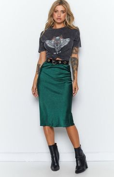 Love this look (minus the knotted tee-I would tuck it). Paired with a graphic tee, and ankle boots, this emerald green skirt looks up to date. Green Knee-length Skirt For Night Out, Casual Pencil Maxi Skirt For Night Out, Casual Midi Skirt For Night Out, Casual Midi Length Skirt For Night Out, Trendy Long Green Skirt, Trendy Green Long Skirt, Casual Party Pencil Skirt, Trendy Relaxed Midi Skirt, Casual Party Midi Skirt