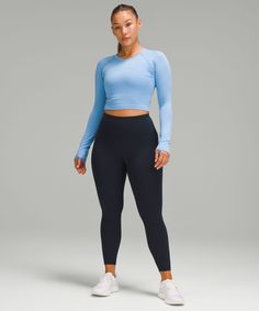 Train hard, not hot. Powered by Everlux fabric, this pocketed version of our Wunder Train collection lets you get sweaty, stay focused, and keep workout essentials close. Designed for Training. Our Contour Fit has an adjusted hip-to-waist ratio. We narrowed the waistband so it doesn't gape and added more room through the hips and thighs to fit your curves:Intended to sit above ankle:Check out our Size Guide to learn more about how Contour Fit styles measure up. Side drop-in pockets. Hidden pocket in the waistband has space for your card and keys. Waistband drawcord keeps your leggings in place so you don't have to pull them up. Fitted Mid-rise Lululemon Activewear, Lululemon Fitted Mid-rise Activewear, Train Collection, Wunder Train, Workout Essentials, Leggings With Pockets, Women Pants, Hidden Pocket, High Rise Leggings