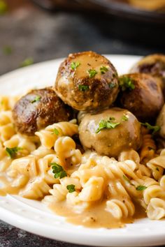 swedish meatballs and pasta on a plate with the title vegan swedish meatballs