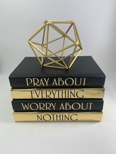 three books stacked on top of each other with the words pray about everything, worry about nothing