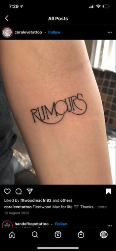 a tattoo with the word run outs written in cursive writing on it's arm