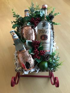 Alcohol Christmas Basket, Booze Basket Ideas Christmas, Liquor Basket Ideas Christmas, Vodka Christmas Gifts, Tito’s Vodka Gift Basket, Tito’s Gift Basket, Christmas Booze Basket, Boozy Basket Ideas, Tequila Christmas Gift Ideas