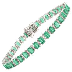 The Following Item we are offering is this Rare Important Radiant 18KT Gold Gorgeous Glittering and Sparkling Magnificent Fancy Shaped Tapered Baguette Green Emerald and Round Diamond Bracelet. Bracelet Contains over 10CTS of Beautiful Fancy Emerald Cut Tapered Baguette Green Emeralds and Round Diamonds!!! This Magnificent Bracelet is a Rare Sample New with Tags $15,000 and is from a Top Private Manufacturer that are found in Important Five Star Hotel and Fine Jewelry Stores. A Rare Breathtaking Round Diamond Bracelet, Diamond Bracelet Design, Five Star Hotel, Bracelet Design, Star Hotel, Green Emerald, Emerald Diamond, Tennis Bracelet, Emerald Cut