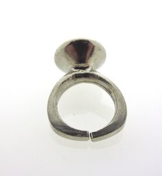 Ring made of pewter with a diameter of 16 mm. Although the ring is adjustable because of its open end, there are different sizes starting with size 15 ending with size 18. Consider carefully which size you pick. The markings on these rings are 'B.L.' or 'B.L. tin' and/or 'pewter of Denmark'. Bent Larsen is a famous Danish jewelry designer, born in Assens, Denmark. He started making pewter (hardened tin) jewelry in his workplace in Husby in the late 1960s. His work is very recognizable by the bea Adjustable Nickel-free Metal Crystal Ring, Vintage Adjustable Silver Crystal Ring, Adjustable Antique Silver Nickel-free Rings, Adjustable Nickel-free Antique Silver Rings, Vintage Adjustable Nickel-free Crystal Ring, Adjustable Silver Crystal Ring, Danish Jewelry, Tin Jewelry, Pewter Ring