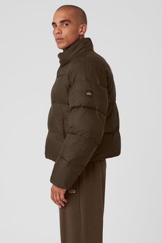 Step out with Alo’s bestselling jacket: the Platinum Puffer. Made with water-resistant ripstop fabric and a puffy fill, this warming layer is the go-to for good reason. An adjustable cinch at the waist locks in the heat while zippered side pockets keep your hands toasty and your stuff secure. Puffer with adjustable cinched waist Zippered side pockets Designed & uniquely fit for every size Wear-tested by our in-house team for the perfect fit Sporty Recycled Polyester Puffer Jacket For Cold Weather, Versatile Puffer Outerwear For Outdoor, Outdoor Puffer Jacket In Recycled Polyester, Weatherproof Puffer Jacket In Recycled Polyester For Fall, Weatherproof Recycled Polyester Puffer Jacket For Fall, Versatile Nylon Puffer Jacket For Cold Weather, Sporty Recycled Polyester Puffer Outerwear, Functional Recycled Polyester Puffer Jacket For Fall, Alo Yoga Long Sleeve Puffer Jacket For Fall