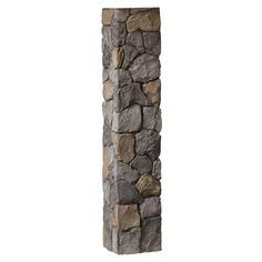 a tall stone pillar made out of rocks