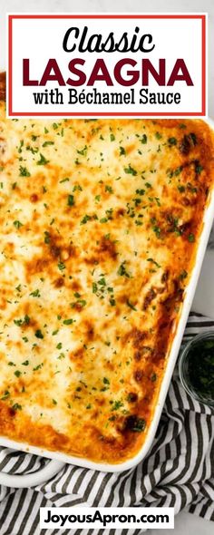 a casserole dish with cheese and parsley on top, in a white baking dish