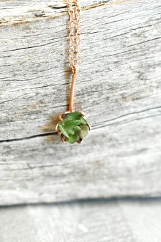 Rough Nephrite Jade lotus pendant necklace. A flower pendant in shimmering 14K rose gold fill and soft greens of Jade, an August birthstone. My copyrighted Lotus design series is flourishing with this fresh Jade gemstone, hugged by rose gold fill. Very pretty, petally and delicate. You choose the necklace length. Ready to ship worldwide in under 7 days. Scroll to read more. *My 14K Rose Gold fill is 5 layers of solid gold over sterling* SHIPPING INFO: : Ships within 7 business days. You now get Delicate Green Flower Pendant Jewelry, Green Gemstone Flower Pendant Jewelry, Green Gemstone Flower Pendant Necklace, Green Gemstone Flower Pendant Necklaces, Unique Opal Ring, Info Ships, Lotus Flower Jewelry, Jade Pendant Necklace, Unique Opal