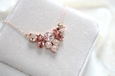 - Handmade to order with Premium European Crystals - vintage rose, blush rose, rose gold and silk stones - Rose gold plated brass - Available in other finishes and crystals upon request - Pendant measures 1.5 inch x .75 inch - Chain measures 16 inches and extends to 18 inches - Each piece is gift wrapped Delicate Rose Gold Bridal Necklace Gift, Delicate Rose Gold Bridal Necklace For Party, Delicate Pink Necklace For Bridesmaid Gift, Dainty Rose Gold Necklace For Bridesmaids, Dainty Pink Necklaces For Wedding, Delicate Rose Gold Bridesmaid Jewelry, Elegant Blush Necklace For Gift, Elegant Rose Gold Necklaces For Wedding Gift, Elegant Rose Gold Necklace For Wedding Gift