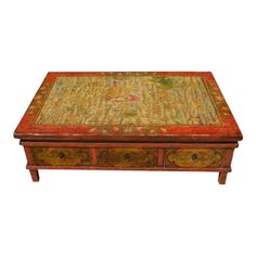 This is the most awesome coffee table! Gorgeous colors. It is wood & solid / sturdy. Heavy even with the drawers removed. The top has all different animals, hand painted possibly with dragons & such. This appears to be canvas, looking at the edges, which does have some wear. 6 drawers all with metal pull rings. I have no idea on the age or origin. Approx 47" x 32" x 15" high. Asian Coffee Table, Antique Coffee Tables, Acrylic Coffee Table, Orange Wood, Acrylic Table, Cool Coffee Tables, Wood Coffee Table, Coffee Table Vintage, Wooden Coffee Table