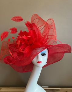 "Red wide brim sinamay hat with large red bow and feather flowers, elegant, light and comfortable to wear. Head size is about 22.5\" unless otherwise requested. All hats include a sizing band to adjust for a comfortable fit.  Key Features: Wide brim Appr: 6\" Head Grith Appr: 22.5\" and adjustable to fit sizes smaller than 22.5\" Crown Deep Appr: 4.5\" Processing Time: 1-3 business days Warm tips:  ❤️Group discount on 3 or more pieces, please contact me for further information on group discount. Red Curved Brim Fascinator For Garden Party, Red Brimmed Fascinator For Church, Red Mini Hats For Kentucky Derby Garden Party, Red Summer Fascinator For Garden Party, Red Hat For Garden Party And Kentucky Derby, Elegant Red Fascinator For Garden Party, Elegant Red Mini Hat With Flat Brim, Elegant Red Wide Brim Top Hat, Red Feathered Fascinator For Kentucky Derby