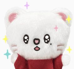 a white teddy bear wearing a red sweater with stars on it's chest and eyes