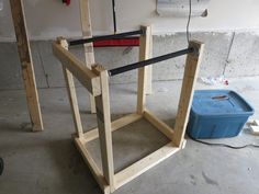 the frame is being constructed and ready to be used as a workbench for an art project