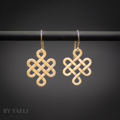 Dangle earrings -Introducing our Gold Celtic Infinity Knot Dangle Earrings, where timeless elegance meets symbolic infinity. Crafted with exquisite detail, these earrings showcase the ancient beauty of the Celtic infinity knot, a symbol of endless life and eternal love. Made from premium gold, they exude a subtle shimmer that enhances their intricate design, making them a captivating addition to any outfit. ★Comes in our signature gift box, ready for gift giving.  ★ Available in Gold [ gold-fill Elegant Hypoallergenic Bronze Earrings, Elegant Bronze Hypoallergenic Jewelry, Gold Infinity Earrings Perfect For Gifts, Symbolic Gold Infinity Jewelry, Elegant Gold Infinity Earrings, Symbolic Infinity Gold Jewelry, Symbolic Infinity-shaped Gold Jewelry, Handmade Gold Infinity Jewelry, Elegant Handmade Infinity Jewelry