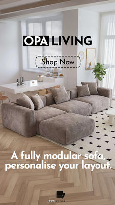 a large sectional sofa sitting on top of a hard wood floor