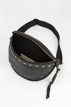 This stylish and convenient bum bag, crafted from genuine leather, adds a touch of flair to every look. Featuring adjustable straps, a crossbody design, and antique brass rivets, the Lucy bag is designed to keep your necessities secure and easily accessible. Perfect for everyday or special occasions, the Lucy bag offers unbeatable style and practicality. Genuine leather 10"W x 6.5"H Comfortable 1.5" wide cotton blend adjustable strap for maximum comfort Zipper closure Antique brass hardware Line Sleep Accessories, Antique Brass Hardware, Cuff Rings, Fragrance Gift, Bum Bag, Slipper Socks, Brass Hardware, Rivets, Belt Bag