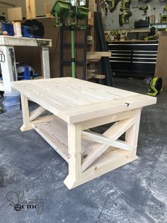 a coffee table made out of wood in a garage