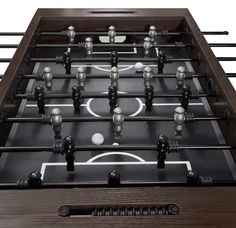 the foosball table is made out of wood and metal