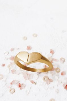 ♥ A perfect gift for Valentines ♥ A statement ring centered with an origami heart. Available in 14K and 18K gold, with options for yellow or white gold. Please select your ring size using the size chart and all other options from the menu above to see the final price for your choice. Please let us know if you'd like the ring to be with a matte or shiny finish. Each ring is made to order therefore production time may take up to 14 business days. Please note that you may be charged certain customs Hart Origami, Heart Ring Engagement, Ring Origami, Origami Ring, Spike Hoop Earrings, Architectural Jewelry, Rings Promise, Origami Heart, Heart Engagement Rings