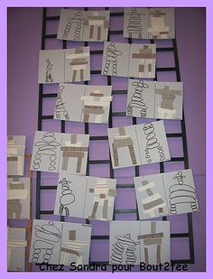 several pieces of paper cut into squares on a purple background with words written in black and white