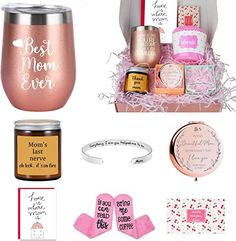 the mother's day gift basket includes a wine glass, pink mitts and other items