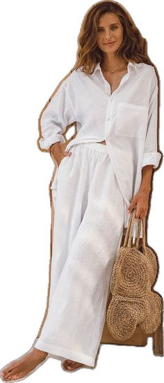 Summer Beach Wide Leg Linen Pants, Summer Beach Linen Wide Leg Pants, White Wide Leg Pants With Pockets For Beach, White Wide Leg Pants With Pockets For Vacation, White Wide Leg Vacation Pants With Pockets, White Linen Pants For The Beach, White Relaxed Fit Summer Pants, White Linen Pants For Beach, Relaxed White Linen Wide Leg Pants For Summer