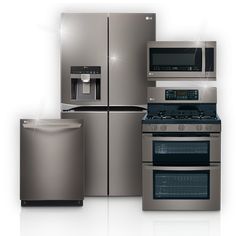 a refrigerator, stove, microwave and dishwasher all in stainless steel