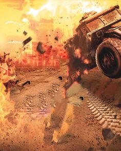 an image of a monster truck in the middle of a fire and dirt area with flames coming out of it