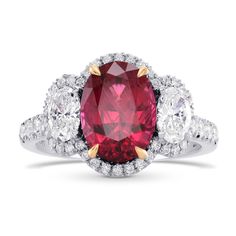 an oval shaped ruby and diamond ring