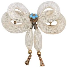 Lovely early Victorian bow pin of white woven hair set with turquoise in 15K gold. Hair jewelry was primarily of a romantic or loving nature. Queen Victoria was given a brooch made from her mother's hair for her 16th birthday. This pin measures 1 3/4" wide by 1 3/4" high by 1/4" deep. Victorian Hair, Gemstone Brooch, Bow Brooch, Antique Gold Jewelry, Antique Brooches, Bow Jewelry, Black Jewelry, Victorian Jewelry, Sea Glass Jewelry