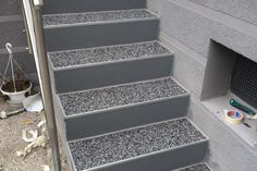 the stairs are made out of concrete and cement blocks