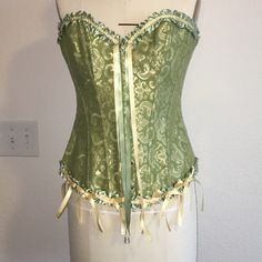 Green And Yellow Satin Corset/Bustier Lined With Black Cotton. Clasps In Front For Easier Fitting. Never Worn! Elegant Green Strapless Corset, Green Elegant Summer Corset, Elegant Green Summer Corset, Green And Gold Outfit, Green Corset Top, Green Corset, Gold Outfit, Yellow Satin, Satin Corset