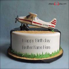 a birthday cake with an airplane on top