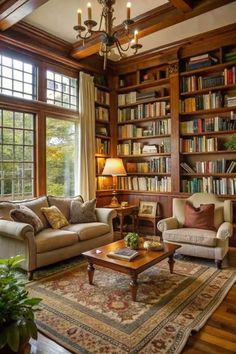 a living room filled with lots of furniture and bookshelves next to a window