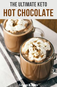 two mugs filled with hot chocolate on top of a checkered table cloth and text overlay that reads, the ultimate keto hot chocolate