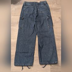 Levi's '94 Cargo Baggy Jeans Size 29x32 Stock Photos Used For Reference Has Ties That Can Cinch At The Ankles Waist 33 Inseam 32 Rise 11 90s Style Levi's Cotton Bottoms, Levi's 90s Style Bottoms With Pockets, 90s Style Denim Blue Cargo Jeans, Levis 94 Baggy Jeans, Womens Baggy Jeans Levi's®, Levi's Jeans, Baggy Jeans, Levis Jeans, Flare Jeans