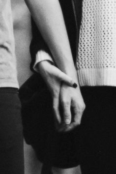 two people holding hands with the words, i'll wait for you even if you never come